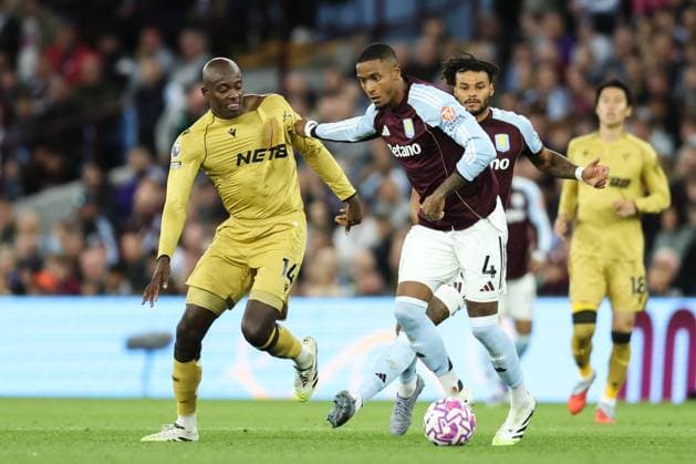 Birmingham, England, 31st August 2025. Ezri Konsa of Aston Villa holds off Jean-Philippe Mateta of Crystal Palace during the Aston Villa vs Crystal Palace Premier League match at Villa Park, Birmingham. Picture credit should read: Jessica Hornby Sportimage EDITORIAL USE ONLY. No use with unauthorised audio, video, data, fixture lists, club league logos or live services. Online in-match use limited to 120 images, no video emulation. No use in betting, games or single club league player publications. SPI_060_JH_Villa_Palace SPI-4102-0060