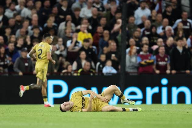 Birmingham, England, 31st August 2025. Adam Wharton of Crystal Palace goes down injured during the Aston Villa vs Crystal Palace Premier League match at Villa Park, Birmingham. Picture credit should read: Jessica Hornby Sportimage EDITORIAL USE ONLY. No use with unauthorised audio, video, data, fixture lists, club league logos or live services. Online in-match use limited to 120 images, no video emulation. No use in betting, games or single club league player publications. SPI_061_JH_Villa_Palace SPI-4102-0061