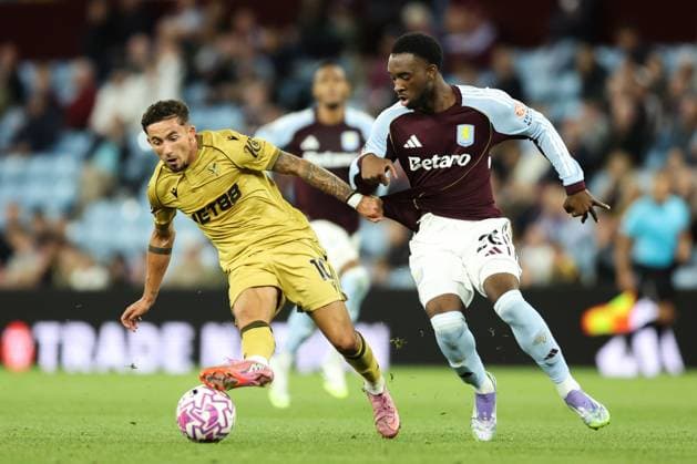 Birmingham, England, 31st August 2025. Yeremi Pino of Crystal Palace breaks with the ball whilst holding off Lamare Bogarde of Aston Villa during the Aston Villa vs Crystal Palace Premier League match at Villa Park, Birmingham. Picture credit should read: Jessica Hornby Sportimage EDITORIAL USE ONLY. No use with unauthorised audio, video, data, fixture lists, club league logos or live services. Online in-match use limited to 120 images, no video emulation. No use in betting, games or single club league player publications. SPI_082_JH_Villa_Palace SPI-4102-0082