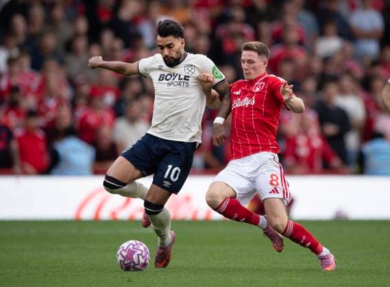 Nottingham Forest v West Ham United - Premier League NOTTINGHAM, ENGLAND - AUGUST 31: Lucas Paqueta of West Ham United and Elliot Anderson of Nottingham Forest in action during the Premier League match between Nottingham Forest and West Ham United at City Ground on August 31, 2025 in Nottingham, England. Elliot Anderson; Lucas Paqueta Nottingham City Ground England United Kingdom Copyright: xVisionhausx 776340382
