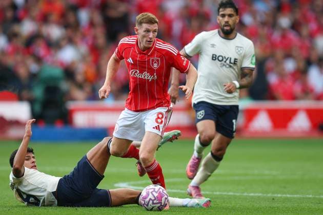 Nottingham, England, 31st August 2025. Elliot Anderson of Nottingham Forest and Mateus Fernandes of West Ham United during the Nottingham Forest vs West Ham United Premier League match at the City Ground, Nottingham. Picture credit should read: James Baylis Sportimage EDITORIAL USE ONLY. No use with unauthorised audio, video, data, fixture lists, club league logos or live services. Online in-match use limited to 120 images, no video emulation. No use in betting, games or single club league player publications. SPI_153_JB_FOREST_WESTHAM SPI-4100-0153