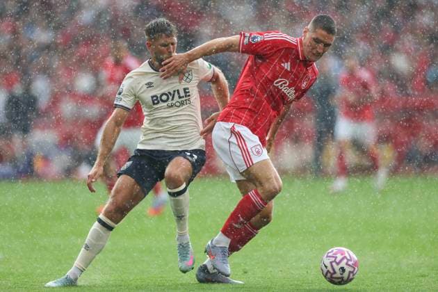 Nottingham, England, 31st August 2025. Nikola Milenkovic of Nottingham Forest and Niclas Fullkrug of West Ham United during the Nottingham Forest vs West Ham United Premier League match at the City Ground, Nottingham. Picture credit should read: James Baylis Sportimage EDITORIAL USE ONLY. No use with unauthorised audio, video, data, fixture lists, club league logos or live services. Online in-match use limited to 120 images, no video emulation. No use in betting, games or single club league player publications. SPI_156_JB_FOREST_WESTHAM SPI-4100-0156