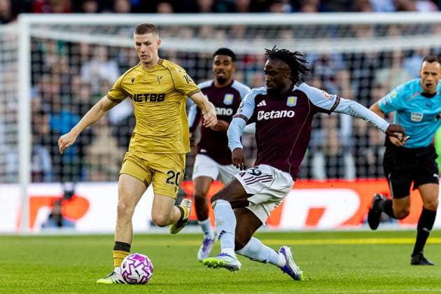 Aston Villa v Crystal Palace Premier League 31 08 2025. Crystal Palace midfielder Adam Wharton (20) tackled by Aston Villa forward Evann Guessand (29) during the Premier League match between Aston Villa and Crystal Palace at Villa Park, Birmingham, England on 31 August 2025. Birmingham Villa Park West Midlands England Editorial use only DataCo restrictions apply See www.football-dataco.com , Copyright: xManjitxNarotrax PSI-22724-0068