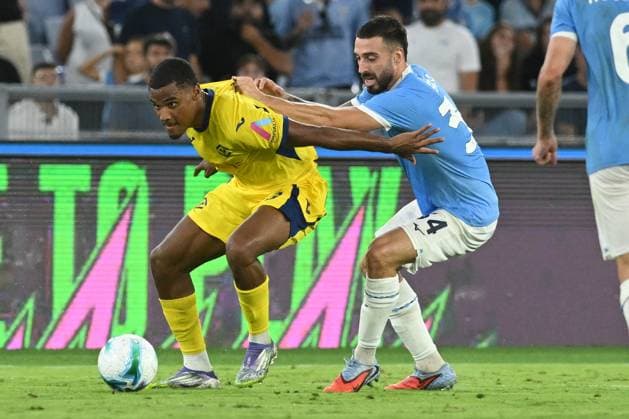CALCIO - Serie A - SS Lazio vs Hellas Verona FC Tijjani Noslin of SS Lazio competes for the ball with Amin Sarr of Hellas Verona FC during the Serie A Enilive between SS Lazio vs Hellas Verona FC at Olimpic Stadium Rome Italy  Copyright: xIPAxSport ABACAx