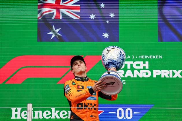 (250901) -- AMSTERDAM, Sept. 1, 2025 -- McLaren s Australian driver Oscar Piastri lifts the trophy on the podium after the 2025 Formula One Dutch Grand Prix at the Zandvoort Circuit in Zandvoort, near Amsterdam, the Netherlands, on Aug. 31, 2025. (Photo by Xinhua) (SP)NETHERLANDS-ZANDVOORT-F1-DUTCH GRAND PRIX QianxJun 