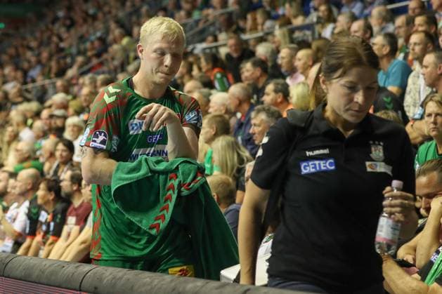 03.09.2025, xtgx, SC Magdeburg - ThSV Eisenach v.l. Magnus Saugstrup (Magdeburg, 23) verletzt verletzung Magdeburg