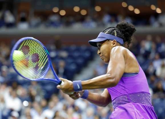 Naomi Osaka of Japan returns a ball to Karolina.Muchova of Czechia in the first set in their quarterfinal match in Arthur Ashe Stadium on day 11 at the 2025 US Open Tennis Championship at the USTA Billie Jean King National Tennis Center in New York City on Wednesday, September 3, 2025.  NYP20250903132 JOHNxANGELILLO