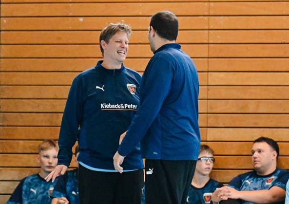 05.09.2025, xlakx, Handball Daikin HBL,Training Fuechse Berlin v.l. Nicolej Krickau (Fuechse Berlin Trainer), Dejan Milosavljev (Fuechse Berlin) im Gespraech Berlin