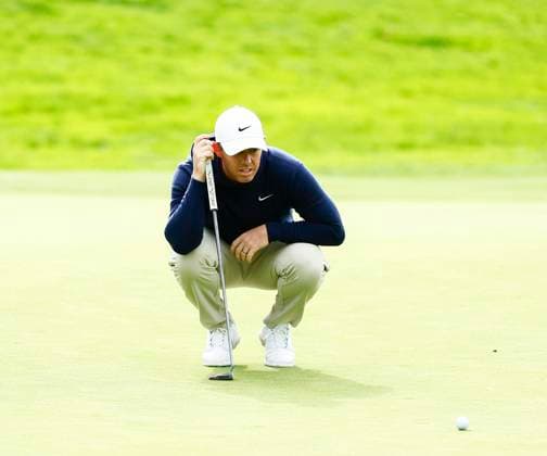 5th September 2025; The K Club, Straffan, County Kildare, Ireland: Amgen Irish Open Golf Second Round; Rory McIlroy of Northern Ireland lines up his putt on the 12th green  PeterxFitzpatrick