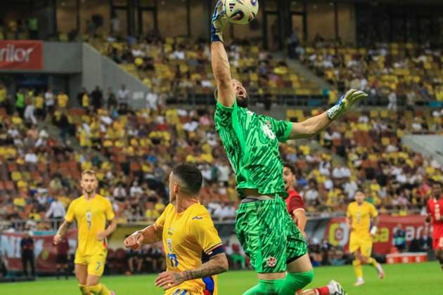 September 05.2025, Test match, National Arena, Bucharest, Romania vs Canada 1 Oscar Gadeberg Buur jumps to catch the ball in front of 10 Nicolae Stanciu