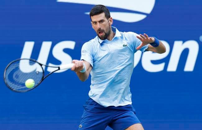Novak Djokovic of Serbia returns the ball to Carlos Alcaraz of Spain in the 1st set in a Men s semifinal match at the 2025 US Open Tennis Championship at the USTA Billie Jean King National Tennis Center in New York City on Friday, September 5, 2025.  NYP20250905907 JOHNxANGELILLO