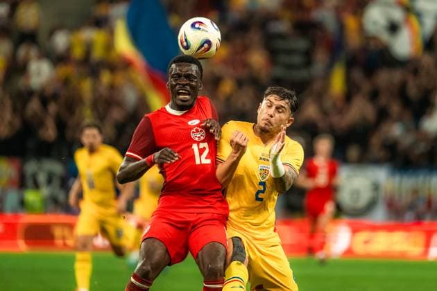Romania v Canada International Friendly, Länderspiel, Nationalmannschaft Match BUCHAREST, ROMANIA, SEPTEMBER 5, 2025 Romania v Canada Tani Oluwaseyi and Andrei Ratiu during the match at the National Arena in Bucharest. Copyright: xVLADxBEREHOLSCHIx