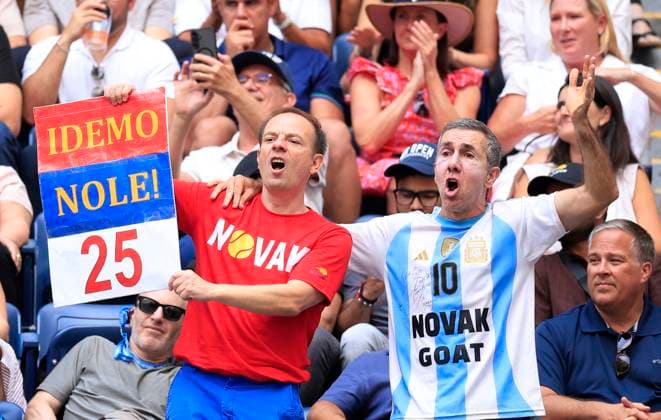 Fans of Novak Djokovic of Serbia watch him play Carlos Alcaraz of Spain in a Men s semifinal match at the 2025 US Open Tennis Championship at the USTA Billie Jean King National Tennis Center in New York City on Friday, September 5, 2025.  NYP20250905939 JOHNxANGELILLO