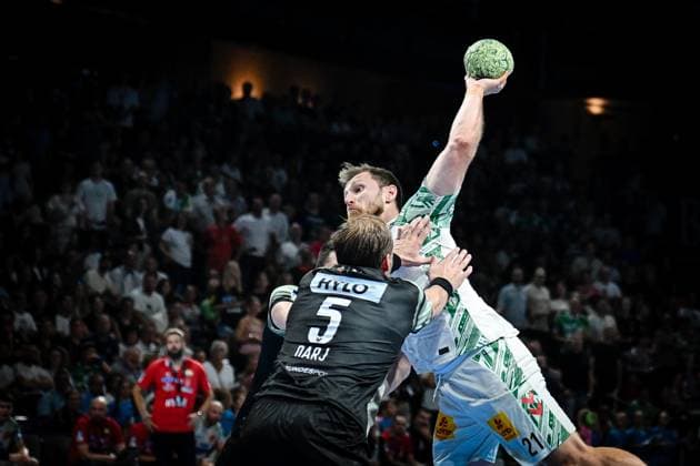 06.09.2025, xlakx, Handball Daikin HBL, Fuechse Berlin - SC Magdeburg v.l. Max Darj (Fuechse Berlin), Albin Lagergren (SC Magdeburg), setzt zum Sprungwurf an Berlin
