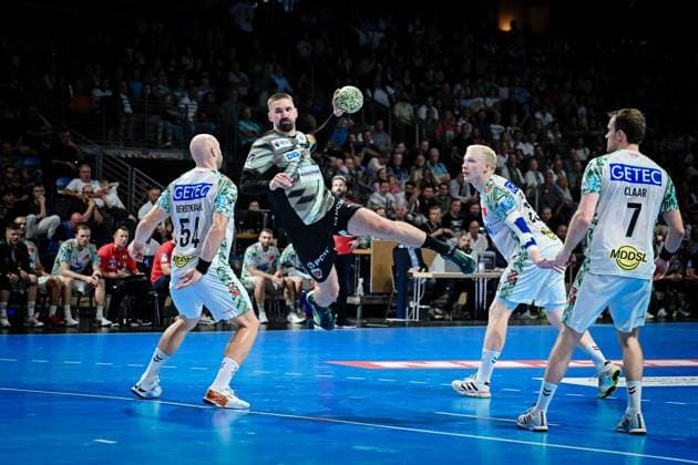 06.09.2025, xlakx, Handball Daikin HBL, Fuechse Berlin - SC Magdeburg v.l. Oscar Bergendahl (SC Magdeburg),Fabian Wiede (Fuechse Berlin)Magnus Saugstrup (SC Magdeburg),Felix Claar (SC Magdeburg) setzt zum Sprungwurf an Berlin