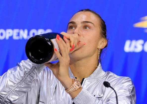 September 6, 2025, Flushing Meadows, New York, USA: Aryna Sabalenka takes a sip of champagne in her press conference, PK, Pressekonferenz after winning her US Open WomenÃ¢â‚¬â ¢s Final match against Amanda Anisimova on Day 14 of the 2025 US Open at USTA Billie Jean King National Tennis Center on Saturday September 6, 2025 in the Flushing neighborhood of the Queens borough of New York City. JAVIER ROJAS PI Flushing Meadows USA - ZUMAp124 20250906_zaa_p124_063 Copyright: xJavierxRojasx
