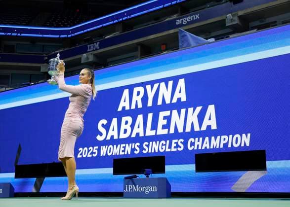 Aryna Sabalenka of Belarus gets spruced up,and brings her US Open Championship Trophy into Arthur Ashe Stadium for photos after defeating Amanda Anisimova at the Women s Finals of the 2025 US Open Tennis Championship in Arthur Ashe Stadium at the USTA Billie Jean King National Tennis Center in Flushing Meadows, New York on Saturday, September 6, 2025. Sabalenka defeated Anisimova 6-3, 7-6 to win her second consecutive US Open Championship.  NYP202509062214 JOHNxANGELILLO