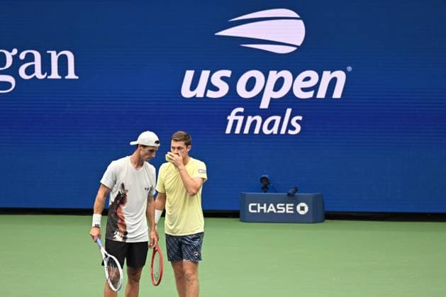 (250907) -- NEW YORK, Sept. 7, 2025 -- Joe Salisbury (L) Neal Skupski communicate during the men s doubles final match between Marcel Granollers of Spain Horacio Zeballos of Argentina and Joe Salisbury Neal Skupski of Britain at the 2025 US Open tennis championships in New York, the United States, Sept. 6, 2025. ) (SP)U.S.-NEW YORK-TENNIS-US OPEN-MEN S DOUBLES-FINAL LixRui 