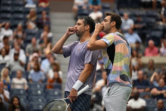 (250907) -- NEW YORK, Sept. 7, 2025 -- Marcel Granollers (R) Horacio Zeballos communicate during the men s doubles final match between Marcel Granollers of Spain Horacio Zeballos of Argentina and Joe Salisbury Neal Skupski of Britain at the 2025 US Open tennis championships in New York, the United States, Sept. 6, 2025. ) (SP)U.S.-NEW YORK-TENNIS-US OPEN-MEN S DOUBLES-FINAL LixRui 