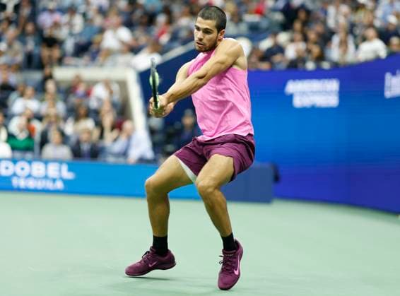 Carlos Alcaraz of Spain hits a return to Jannik Sinner of Italy in the fourth set in the Men s Finals of the 2025 US Open Tennis Championship in Arthur Ashe Stadium at the USTA Billie Jean King National Tennis Center in Flushing Meadows, New York, on Sunday, September 7, 2025.  NYP20250907172 COREYxSIPKIN