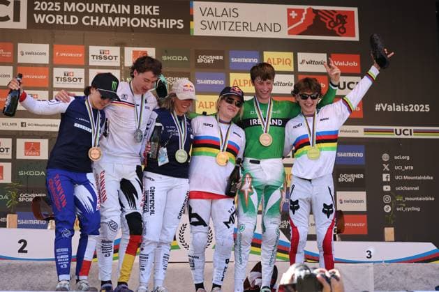 07 09 2025, Champà ry, Champà ry 2025 UCI Mountain Bike World Championships, from right to left: Marine Cabirou (FRA), Bronze, Henri Kiefer (GER), Silver, Myriam Nicole (FRA), Silver, Valentina Höll (AUT), Gold, Ronan Dunne (IRL), Bronze, and Jackson Goldstone (CAN), Gold at the Downhill World Championship, WM, Weltmeisterschaft during the award ceremony Champà ry Grand Paradis Valais Switzerland Copyright: xJustPictures.ch FrancescoxMinghettix jp-en-FrMi-MNG_9148