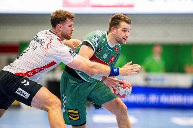 08.09.2025 - Handball, 2025 2026, 1. Bundesliga, 3. Spieltag, GWD Minden - SG Flensburg-Handewitt: (L-R) Johannes Golla (Flensburg), Ian Weber (Minden)
