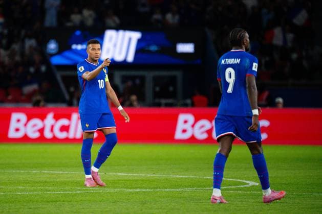 FOOTBALL : France vs Islande - Paris - 09 09 2025 Kylian Mbappe ( 10 - France ) celebrates with Marcus Thuram ( 9 - France ) during the European Qualifying round match between France and Iceland at Parc des Princes on September 09, 2025 in Paris, France. ( Photo by Federico Pestellini PsnewZ ) - Parc des PrincesFrance  Copyright: xFedericoxPestellinix