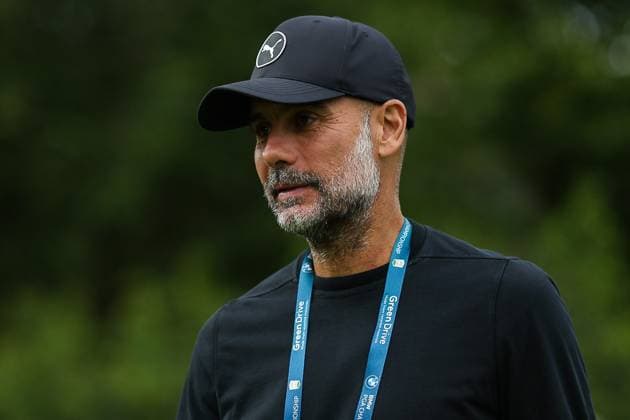 9th September 2025; Wentworth Club, London, England; The BMW PGA, Golf Herren Championship Golf Practice Day 1; Pep Guardiola Man City manager is seen at the 18th green during a practice session  HenningxvonxJagow
