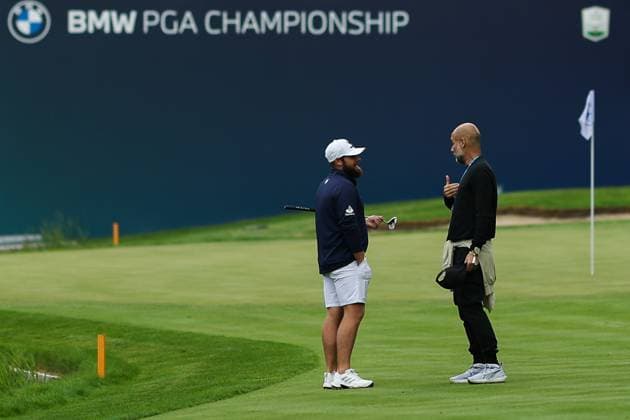 9th September 2025; Wentworth Club, London, England; The BMW PGA, Golf Herren Championship Golf Practice Day 1; Tyrrell Hatton of England and Pep Guardiola Man City manager chat at the 18th green  HenningxvonxJagow