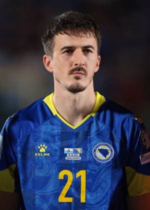 Serravalle, Italy, 6th September 2025. Stjepan Radeljic of Bosnia and Herzegovina looks on during the line up prior to the San Marino vs Bosnia-Herzegovina FIFA World Cup, WM, Weltmeisterschaft, Fussball Qualifier match at San Marino Stadium, Serravalle. Picture credit should read: Jonathan Moscrop Sportimage EDITORIAL USE ONLY. No use with unauthorised audio, video, data, fixture lists, club league logos or live services. Online in-match use limited to 120 images, no video emulation. No use in betting, games or single club league player publications. SPI_078_JM_SANMARINO_BOSNIA_ SPI-4110-0077