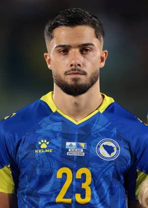 Serravalle, Italy, 6th September 2025. Jusuf Gazibegovic of Bosnia and Herzegovina looks on during the line up prior to the San Marino vs Bosnia-Herzegovina FIFA World Cup, WM, Weltmeisterschaft, Fussball Qualifier match at San Marino Stadium, Serravalle. Picture credit should read: Jonathan Moscrop Sportimage EDITORIAL USE ONLY. No use with unauthorised audio, video, data, fixture lists, club league logos or live services. Online in-match use limited to 120 images, no video emulation. No use in betting, games or single club league player publications. SPI_080_JM_SANMARINO_BOSNIA_ SPI-4110-0079