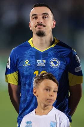 Serravalle, Italy, 6th September 2025. Ivan Basic of Bosnia and Herzegovina looks on during the line up prior to the San Marino vs Bosnia-Herzegovina FIFA World Cup, WM, Weltmeisterschaft, Fussball Qualifier match at San Marino Stadium, Serravalle. Picture credit should read: Jonathan Moscrop Sportimage EDITORIAL USE ONLY. No use with unauthorised audio, video, data, fixture lists, club league logos or live services. Online in-match use limited to 120 images, no video emulation. No use in betting, games or single club league player publications. SPI_083_JM_SANMARINO_BOSNIA_ SPI-4110-0082