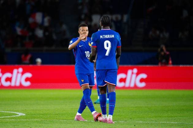 FOOTBALL : France vs Islande - Paris - 09 09 2025 Kylian Mbappe ( 10 - France ) celebrates with Marcus Thuram ( 9 - France ) during the European Qualifying round match between France and Iceland at Parc des Princes on September 09, 2025 in Paris, France. ( Photo by Federico Pestellini PsnewZ ) - Parc des PrincesFrance  Copyright: xFedericoxPestellinix