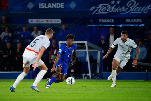 FOOTBALL : France vs Islande - Paris - 09 09 2025 Kingsley Coman ( 7 - France ) and Sverrir Ingason ( 5 - Iceland ) during the European Qualifying round match between France and Iceland at Parc des Princes on September 09, 2025 in Paris, France. ( Photo by Federico Pestellini PsnewZ ) - Parc des PrincesFrance  Copyright: xFedericoxPestellinix