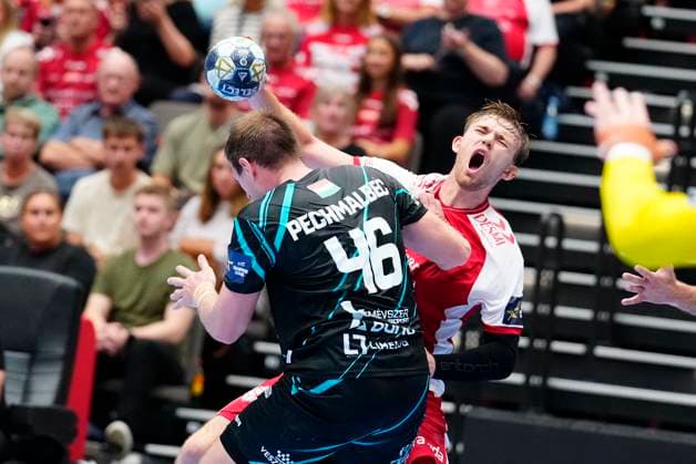 Denmark EHF Champions League Aalborgs Thomas Arnoldsen and Veszprem s Dragan Pechmalbec during EHF Champions League men s handball match between Aalborg Handball and One Veszprém HC at Sparekassen Danmark Arena in Aalborg on Wednesday, September 10, 2025. (Photo: Henning Bagger Scanpix 2025) , Aalborg Denmark Copyright: HenningxBaggerx spdk20250910-195101-L