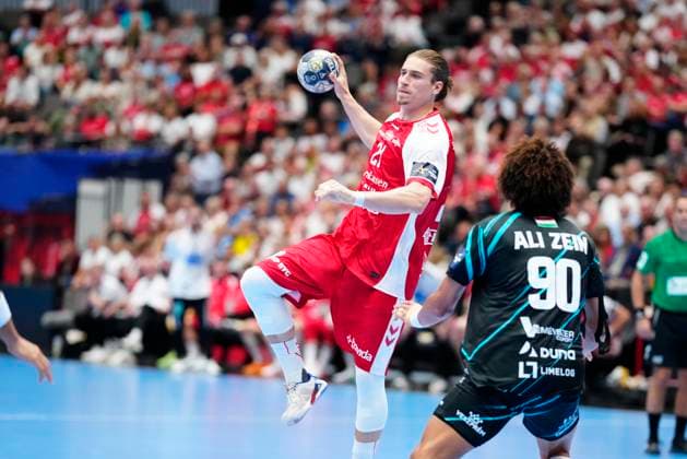 Denmark EHF Champions League Aalborgs Juri Knorr and Veszprem s Ali Zein during EHF Champions League men s handball match between Aalborg Handball and One Veszprém HC at Sparekassen Danmark Arena in Aalborg on Wednesday, September 10, 2025. (Photo: Henning Bagger Scanpix 2025) , Aalborg Denmark Copyright: HenningxBaggerx spdk20250910-201439-L