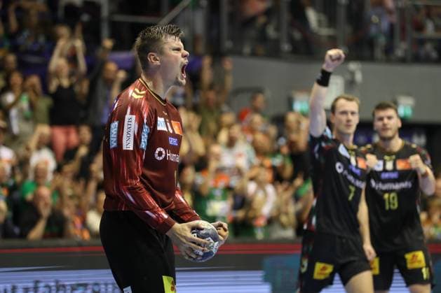 10.09.2025, xtgx, Handball, EHF Champions League, SC Magdeburg - Paris Saint Germain v.l. Sergey Hernandez Ferrer (Magdeburg, 1) Jubelt ueber gehaltenen Ball, abgewehrt, gehalten, Torhueter Magdeubrg