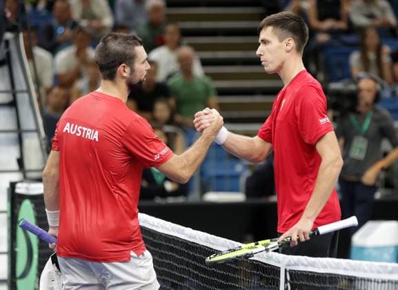 TENNIS - Davis Cup, HUN vs AUT DEBRECEN,HUNGARY,12.SEP.25 - TENNIS - ITF Davis Cup, qualification round 2, Hungary vs Austria. Image shows Jurij Rodionov (AUT) and Fabian Marozsan (HUN).  GEPAxpictures xWalterxLuger