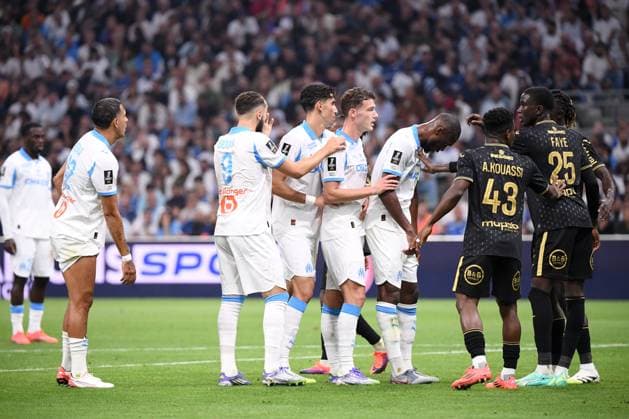 Olympique de Marseille v FC Lorient - Ligue 1 McDonald s 2025 2026 28 Benjamin PAVARD (om) - 19 Geoffrey KONDOGBIA (om) - 21 Nayef AGUERD (om) during the Ligue 1 McDonald s match between Olympique de Marseille and FC Lorient at Stade Velodrome on September 12, 2025 in Marseille, France. Marseille France  Copyright: xFEPx 776348124