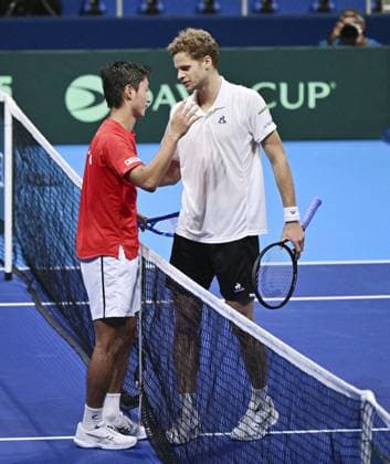 Tennis: Davis Cup Yannick Hanfmann (R) of Germany and Shintaro Mochizuki of Japan greet one another at the net after their singles match in the second round of the Davis Cup team tennis qualifiers at Ariake Coliseum in Tokyo on Set. 12, 2025.  A14AA0004844728P