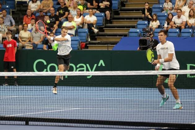 TENNIS - Davis Cup, HUN vs AUT DEBRECEN,HUNGARY,13.SEP.25 - TENNIS - ITF Davis Cup, qualification round 2, Hungary vs Austria. Image shows Zsombor Piros and Fabian Marozsan (HUN).  GEPAxpictures xWalterxLuger