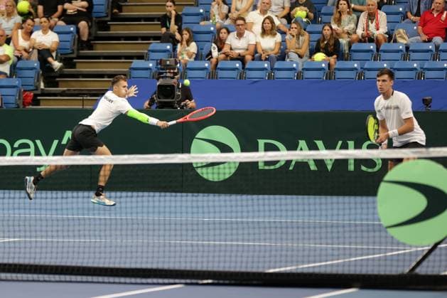 TENNIS - Davis Cup, HUN vs AUT DEBRECEN,HUNGARY,13.SEP.25 - TENNIS - ITF Davis Cup, qualification round 2, Hungary vs Austria. Image shows Zsombor Piros and Fabian Marozsan (HUN).  GEPAxpictures xWalterxLuger