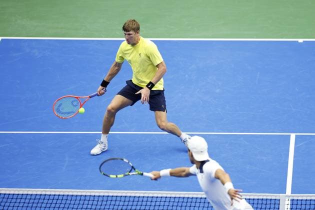 PARTILLE, SWEDEN 20250913 Sweden s AndrÃ Göransson and Erik Grevelius (in cap) in the doubles match against Tunisia s Aziz Ouakaa (in cap) and Moez Echargui in the Davis Cup match between Sweden and Tunisia in Partille arena. PARTILLE SWEDEN x9200x