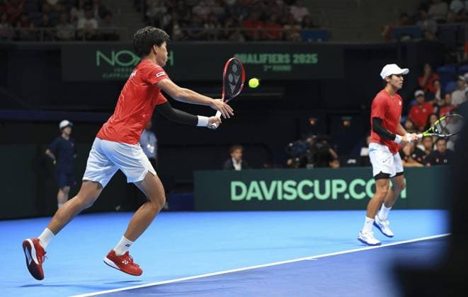 Tennis: Davis Cup Yosuke Watanuki (R) and Takeru Yuzuki of Japan play against Kevin Krawietz and Tim Puetz of Germany in the second round of the Davis Cup team tennis qualifiers at Ariake Coliseum in Tokyo on Set. 13, 2025.  A14AA0004844916P