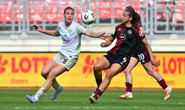 13.09.2025 - Fussball - Saison 2025 2026 - 1. Google Pixel Frauen Bundesliga - 02. Spieltag: 1. FC Nürnberg FCN ( Club Clubfrauen ) - SV Werder Bremen SVW - Sportfoto Zink - xwoxzix - Juliane Wirtz (28, SV Werder Bremen ) Laura Miller (9, 1. FC Nürnberg FCN )