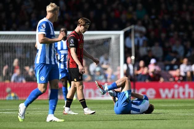 Bournemouth v Brighton and Hove Albion Premier League 13 09 2025. Jack Hinshelwood (13) of Brighton and Hove Albion goes down injure after fouling Evanilson (9) of AFC Bournemouth during the Premier League match between Bournemouth and Brighton and Hove Albion at the Vitality Stadium, Bournemouth, England on 13 September 2025. Bournemouth Vitality Stadium Dorset England Editorial use only DataCo restrictions apply See www.football-dataco.com , Copyright: xGrahamxHuntx PSI-22818-0027