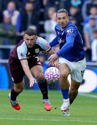 Liverpool, England, 13th September 2025. John McGinn of Aston Villa (L) challenges Jack Grealish of Everton during the Everton vs Aston Villa Premier League match at Hill Dickinson Stadium, Liverpool. Picture credit should read: Andrew Yates Sportimage EDITORIAL USE ONLY. No use with unauthorised audio, video, data, fixture lists, club league logos or live services. Online in-match use limited to 120 images, no video emulation. No use in betting, games or single club league player publications. SPI_002_AY_EVERTON_VILLA SPI-4134-0002