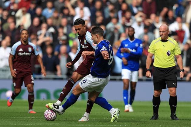 13th September 2025; Hill Dickinson Stadium, Liverpool, England; Premier League Football, Everton versus Aston Villa; James Tarkowski of Everton tackles Morgan Rogers of Aston Villa  DavidxBlunsden