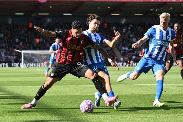 Bournemouth v Brighton and Hove Albion Premier League 13 09 2025. Evanilson (9) of AFC Bournemouth on the attack battles for possession with Ferdi KadÄ±oglu (24) of Brighton and Hove Albion during the Premier League match between Bournemouth and Brighton and Hove Albion at the Vitality Stadium, Bournemouth, England on 13 September 2025. Bournemouth Vitality Stadium Dorset England Editorial use only DataCo restrictions apply See www.football-dataco.com , Copyright: xGrahamxHuntx PSI-22818-0042