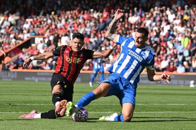 Bournemouth v Brighton and Hove Albion Premier League 13 09 2025. Evanilson (9) of AFC Bournemouth ia tackled by Lewis Dunk (5) of Brighton and Hove Albion during the Premier League match between Bournemouth and Brighton and Hove Albion at the Vitality Stadium, Bournemouth, England on 13 September 2025. Bournemouth Vitality Stadium Dorset England Editorial use only DataCo restrictions apply See www.football-dataco.com , Copyright: xGrahamxHuntx PSI-22818-0040